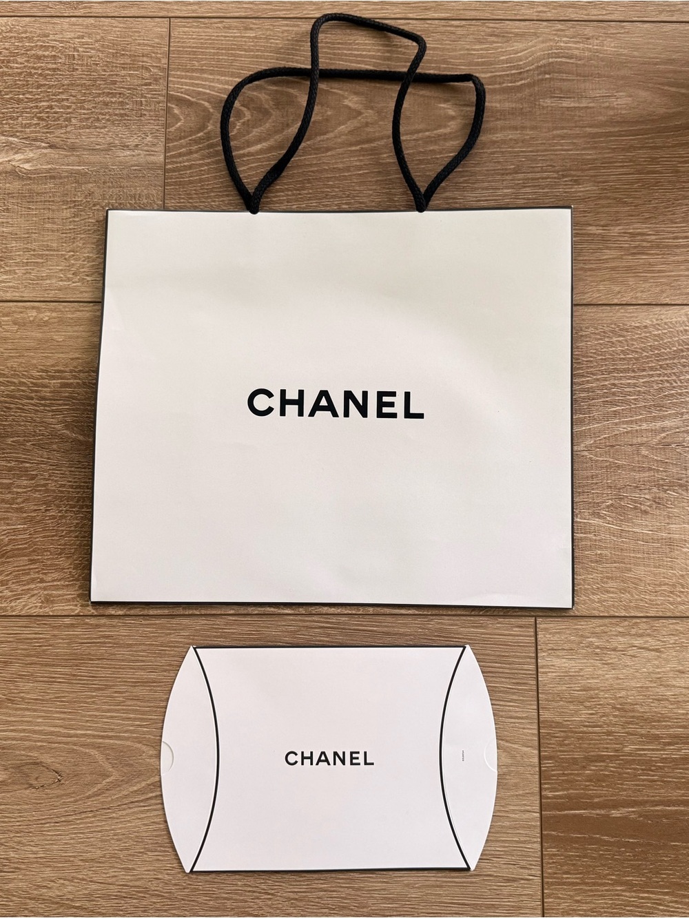 CHANEL White Paper Shopping Tote with Black Handles includes small gift box